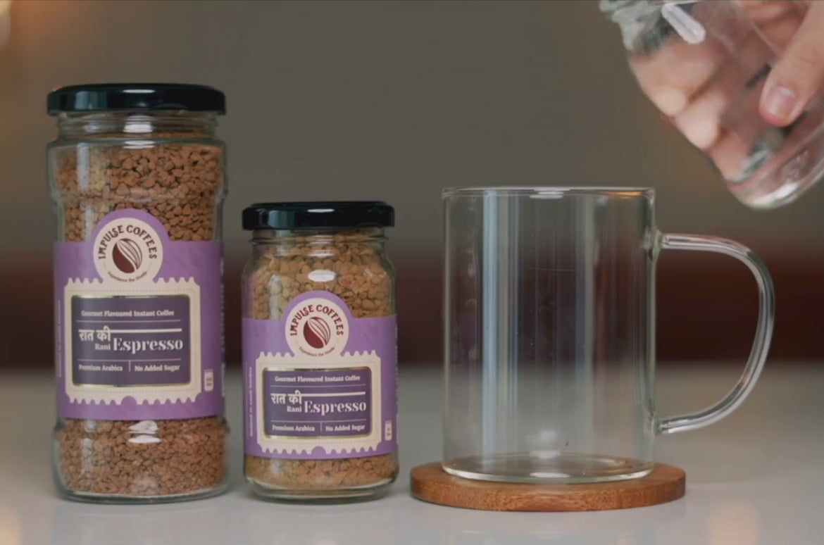 A video on "How to make Raat ki Rani Espresso" by Impulse Coffees, which has a mug full of Raat ki Rani Espresso, and 2 jars viz, 50gms and 100gms of Raat ki Rani Instant Coffees